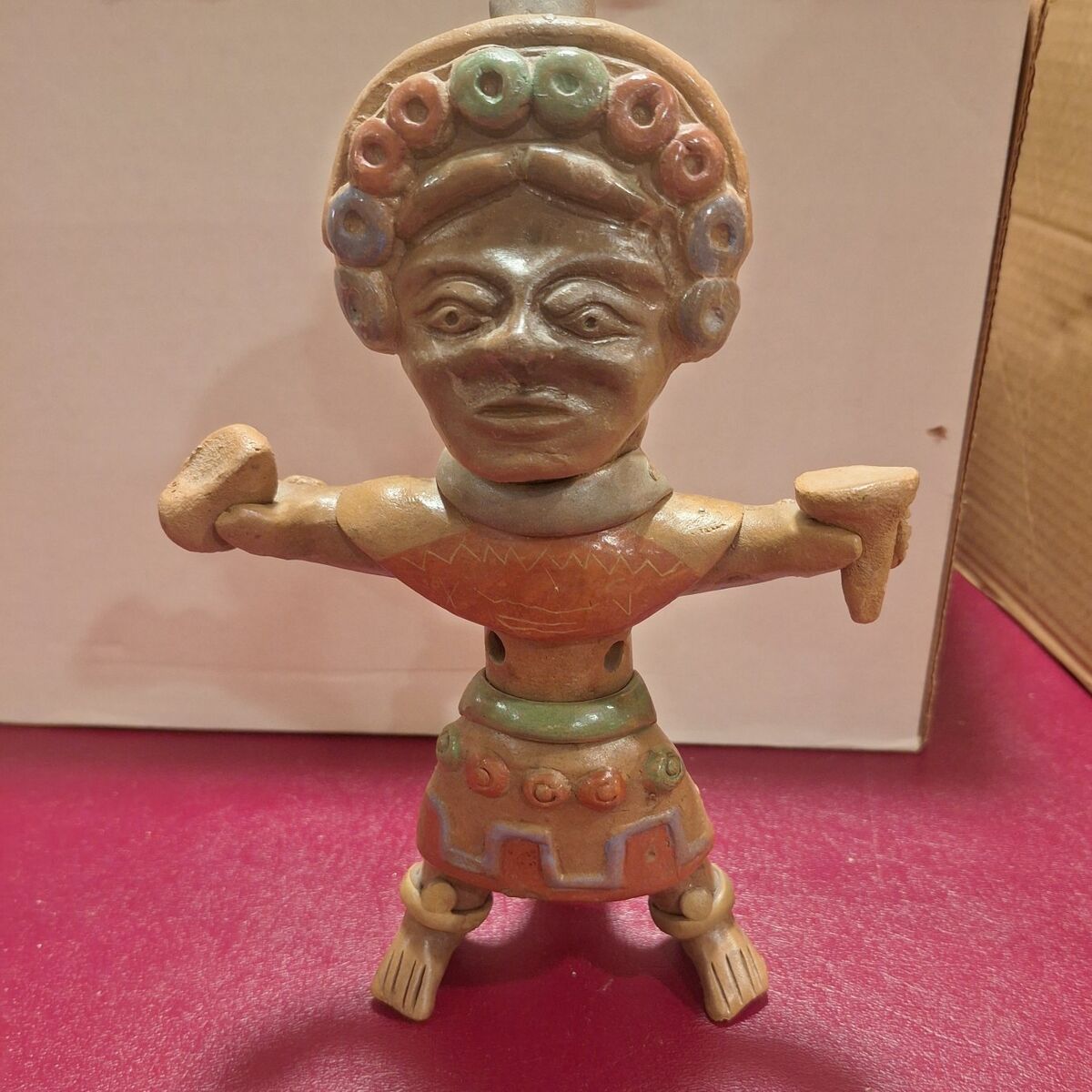 Vintage handcrafted painted clay figurine