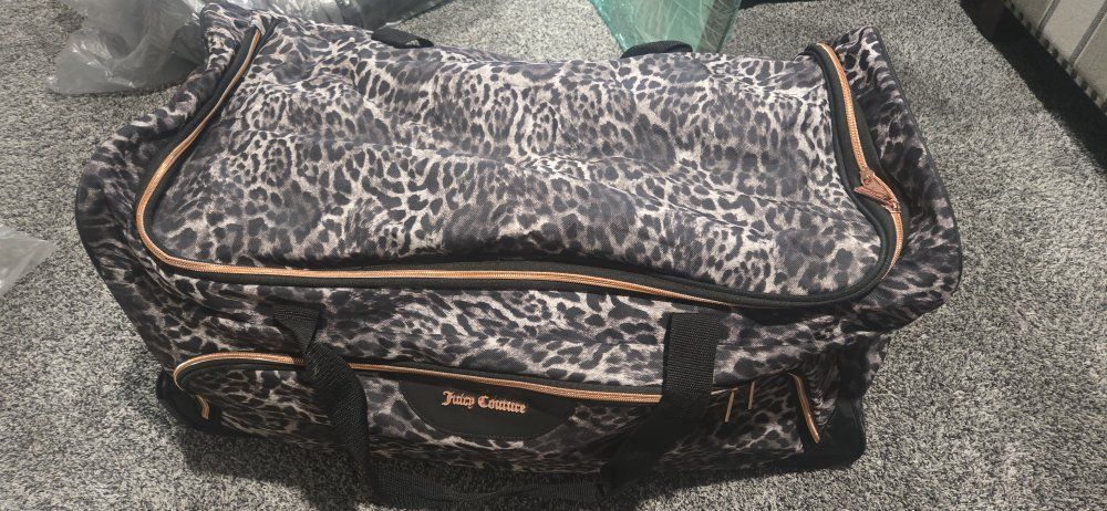 Juicy Couture Leopard Print Rolling Duffle Bag Luggage