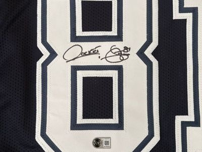 Dallas Cowboys Rocket Ismail signed autographed jersey. Beckett witness COA.