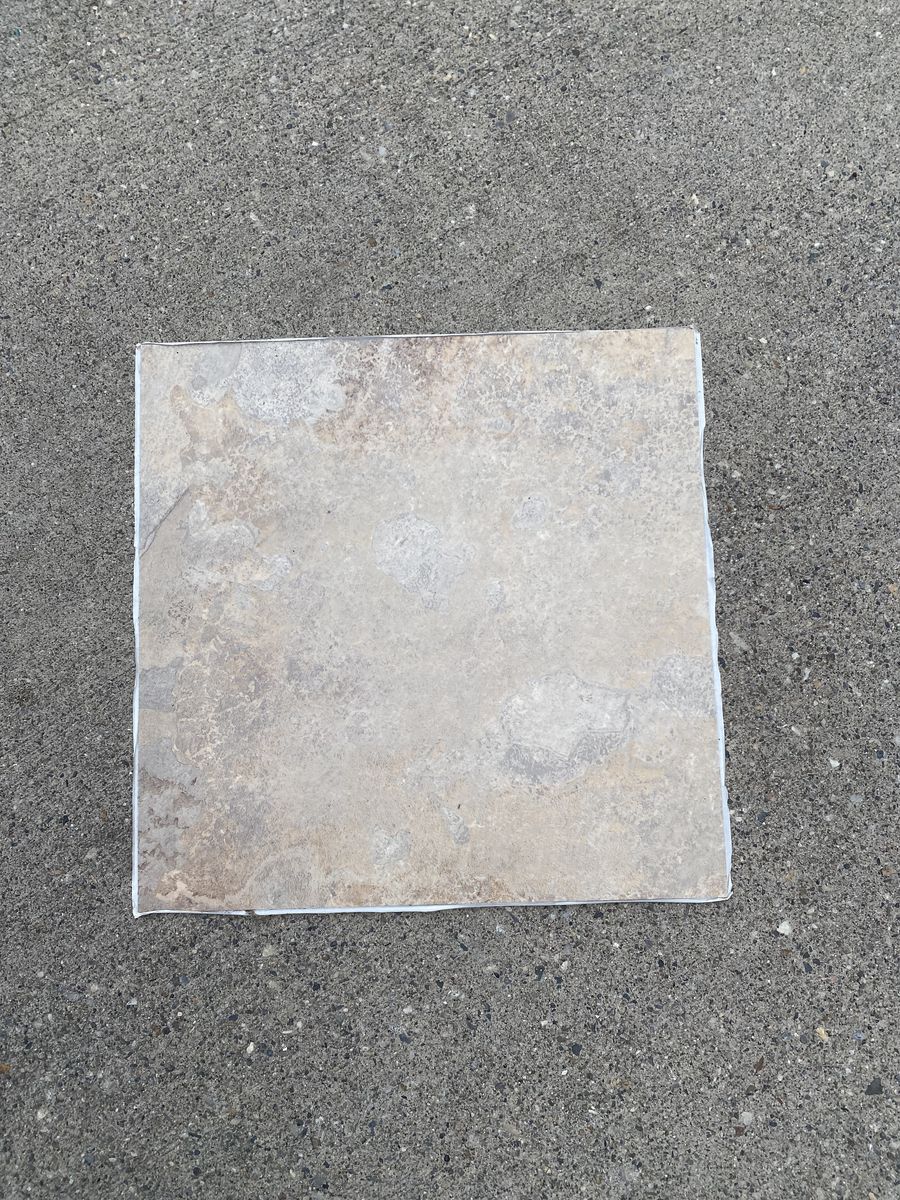 11 square pieces of vinyl flooring $2.00 per square total $22.00 (sticky backing)