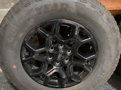 Ford OEM 18 Black Wheels Goodyear Wrangler Territory AT Tires 275/65R18 Set of 4