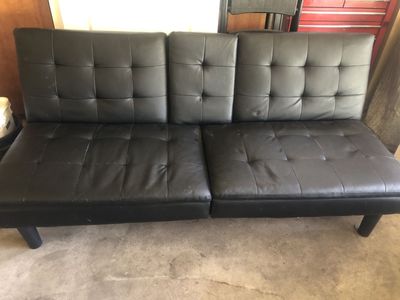 Black Faux Leather Futon Sofa Bed with Cupholders - Versatile Seating & Sleeping Solution