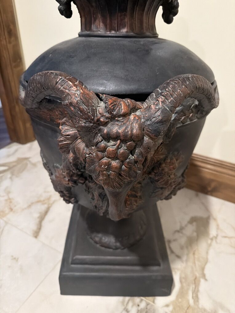 ornate decorative Urn with ram head detail