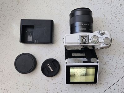Canon M2 mirrorless camera and lens