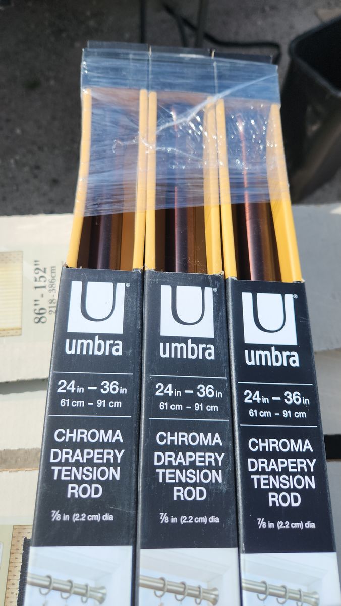 Bronze drapery tension rods