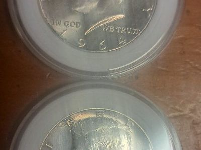 2 Kennedy Half Dollars 1964 90% Silver & 1965 40% Silver Coins in Protective Capsules