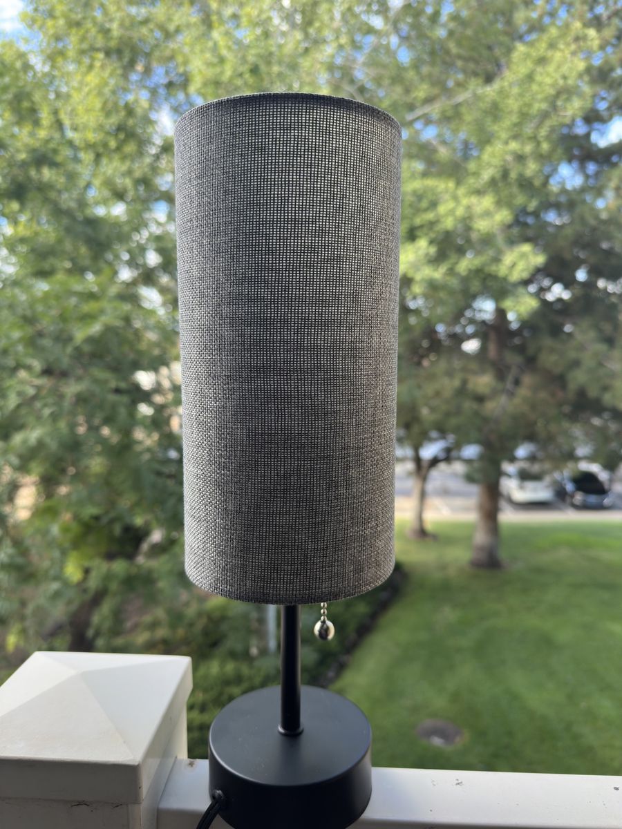 Modern Table Lamp with Cylindrical Gray Shade and Black Base