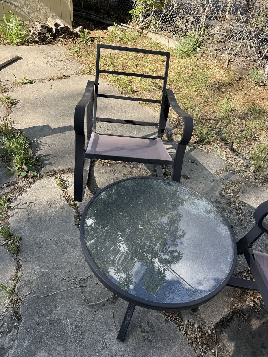 Rocker chairs and small glass table