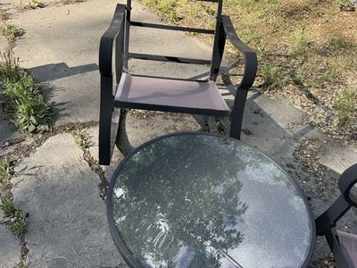 Rocker chairs and small glass table