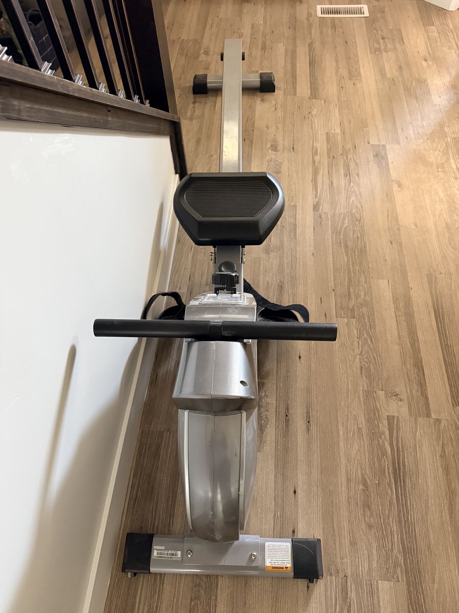 Sunny Health & Fitness SF-RW1205 Rowing Machine - Compact Rower with 12-Level Resistance