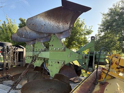 John Deere plows