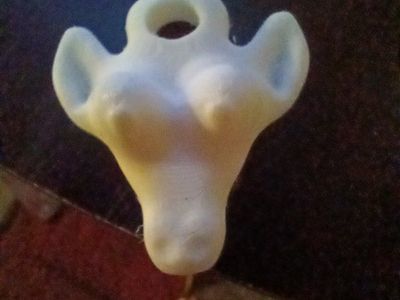 3D printed cow necklace emblem