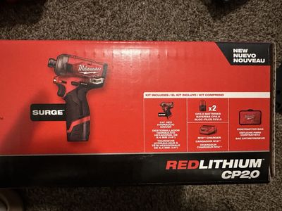M12 fuel Surge 1/4in impact driver.