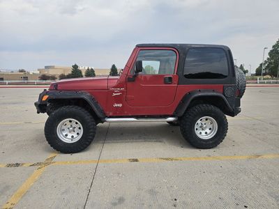 1999 jeep wranger sport TJ trade for a Harley