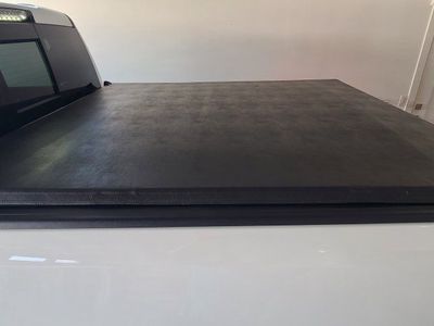 2009-2018 Ram 1500 Black Tri-Fold Tonneau Cover for Truck Bed - Excellent Condition