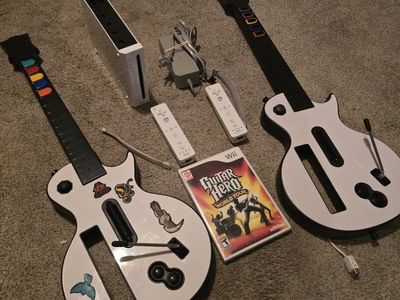 Nintendo Wii Console Bundle with 2 Guitar Hero Controllers, Remotes, Cables & World Tour Game
