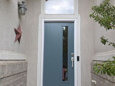 Front door Therma-Tru Fiberglass Insulated Front Door w/ Tall Glass Panel – $850