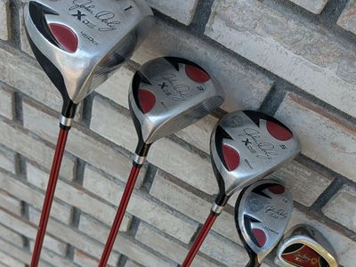 John Daly XDS driver woods hybrid pw