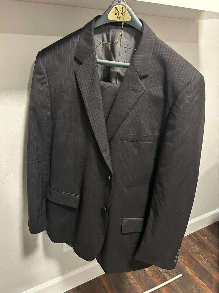 Joseph & Feiss Black stripped size 50L suit coat and size 42 waist pants $100 cash/venmo in Draper