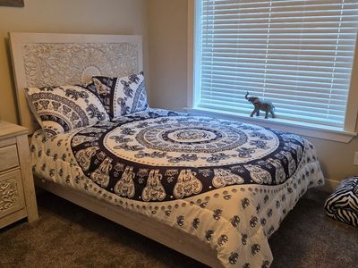 Full size bed frame, mattress, box spring.