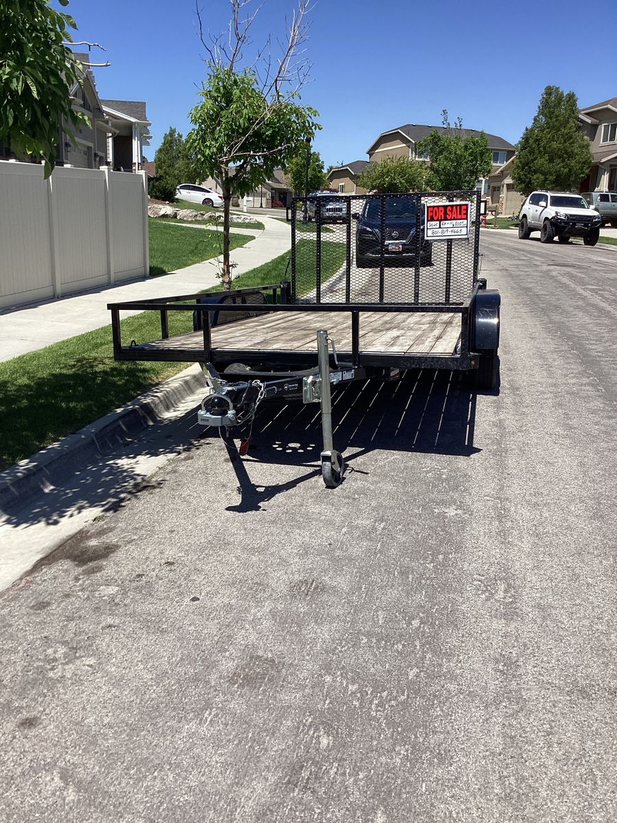 Flatbed utility trailer.