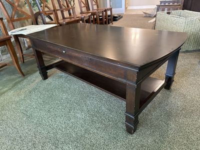 Real wood coffee table with slide out trays