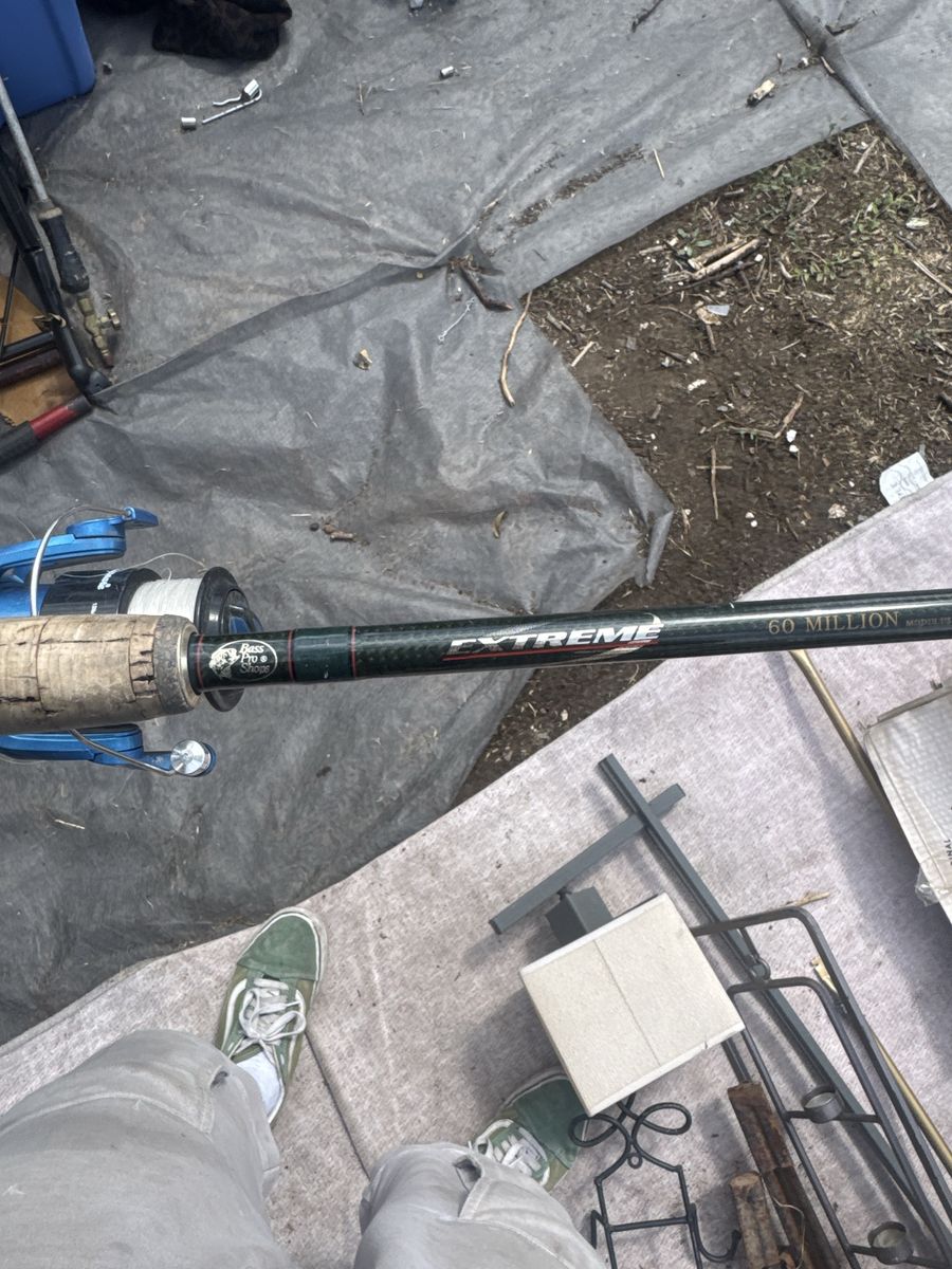 Bass Pro Shops Extreme 7ft Medium Action Spinning Rod with Reel
