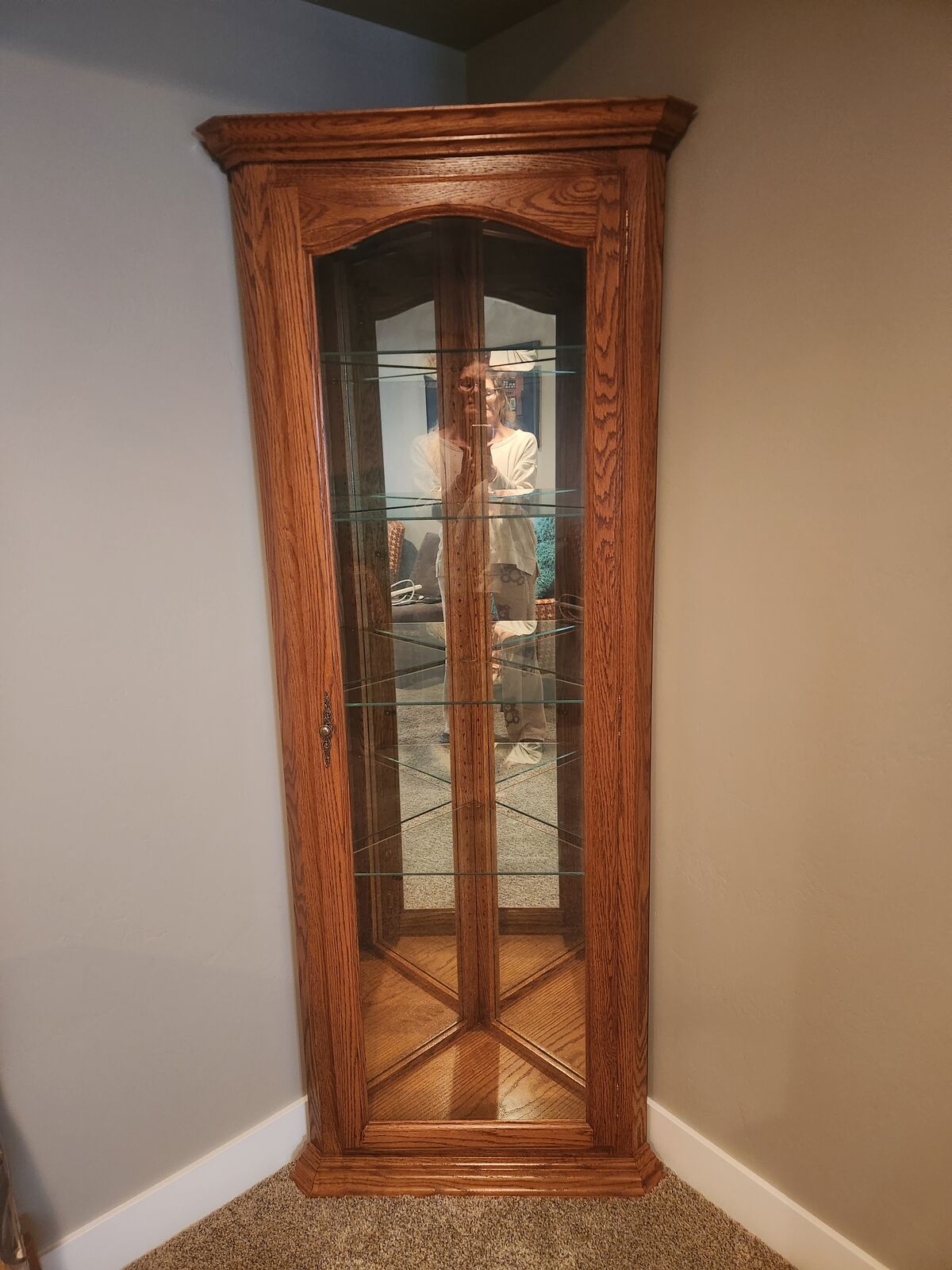 Corner display cabinet, lighted