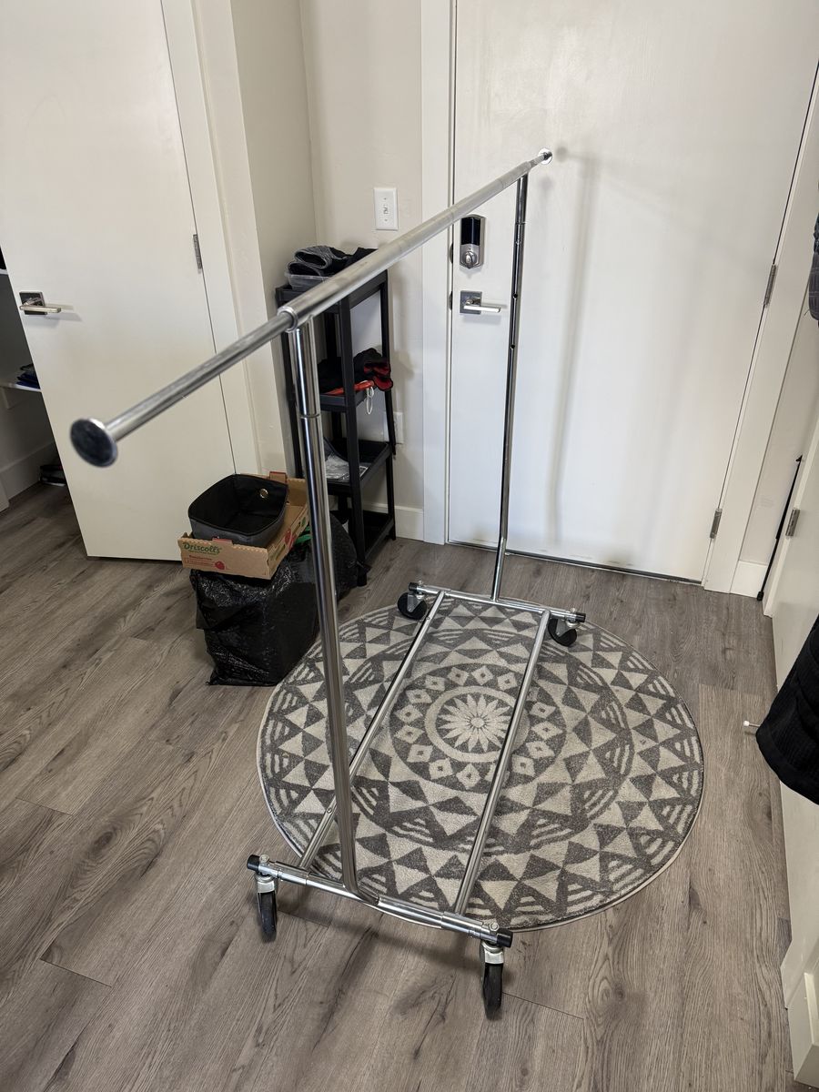 Rolling clothes rack, including the 2 hanging cloth shelves