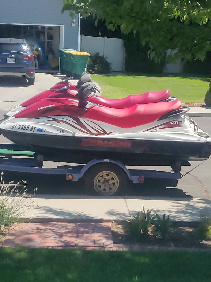 [2] 2009 SeaDoo GTI 130 and trailer