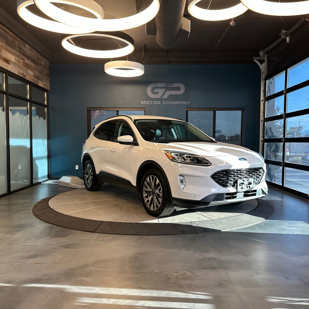 2021 Ford Escape Titanium — rebuilt & branded title, 18% below market