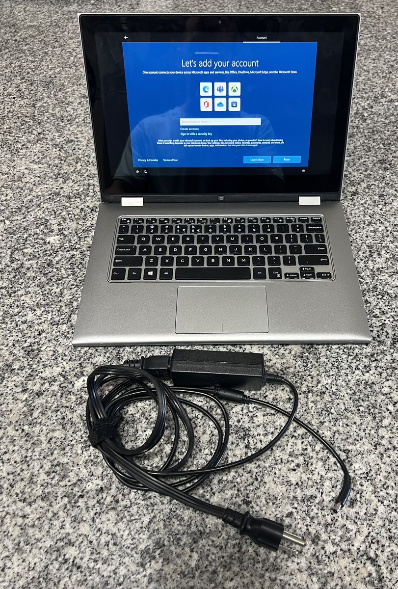 Dell Inspiron i7359-2435SLV 13.3 Inch 2-in-1 Touchscreen Laptop (6th Generation Intel Core i5, 4 GB RAM, 500 GB HDD)