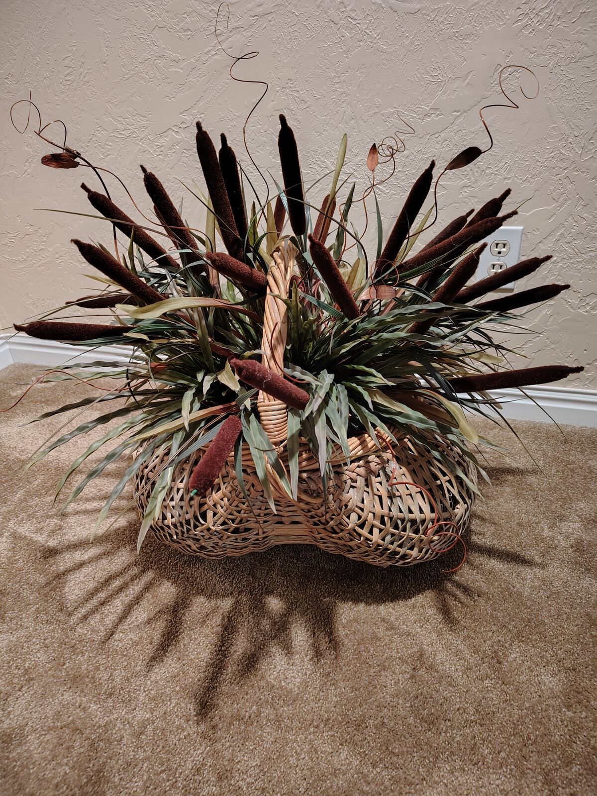 Basket with arrangement.