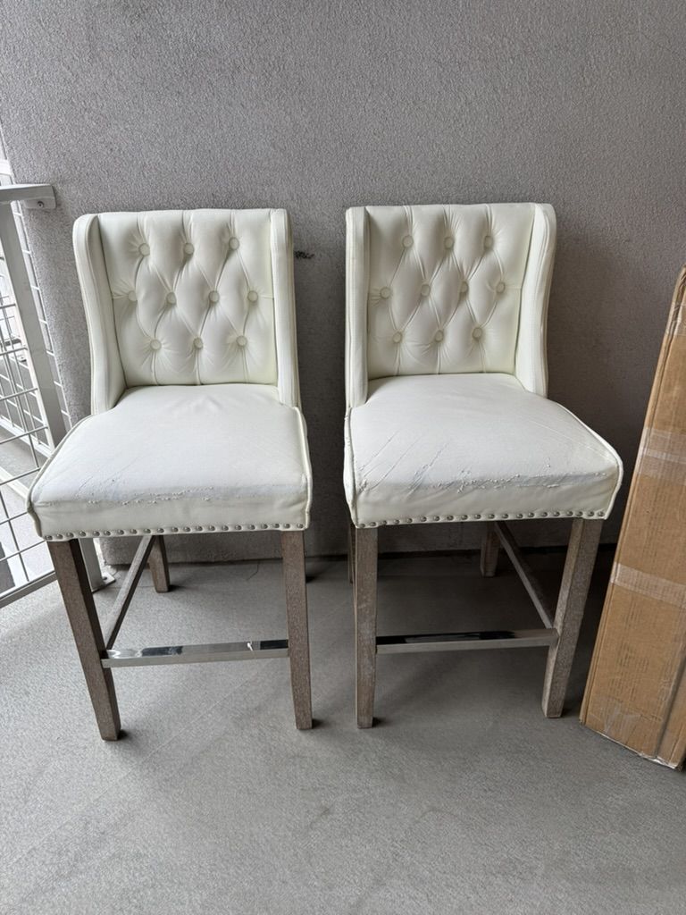 Two used barstools