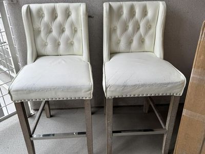 Two used barstools