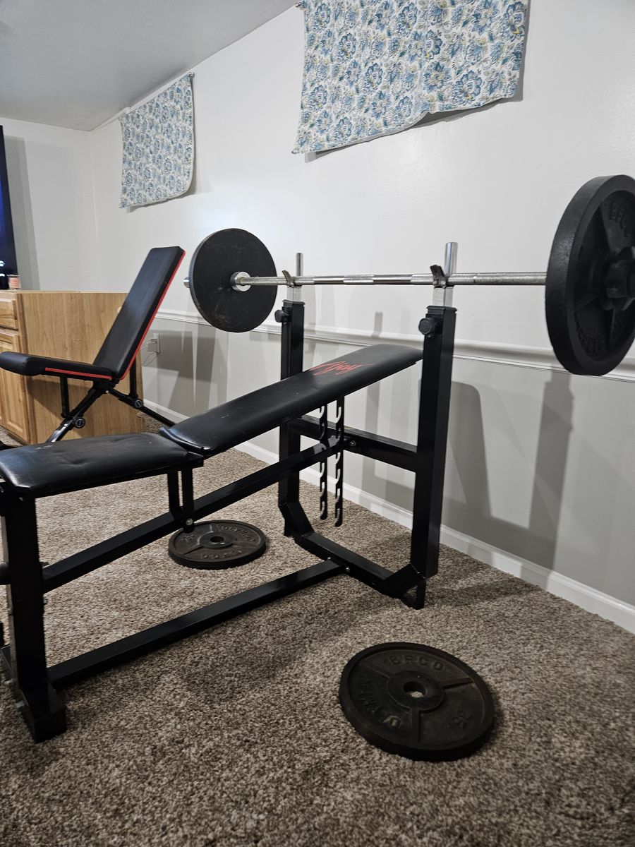 $100 bench press w/bar and plates