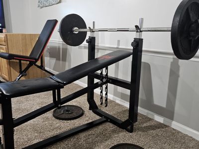 $100 bench press w/bar and plates