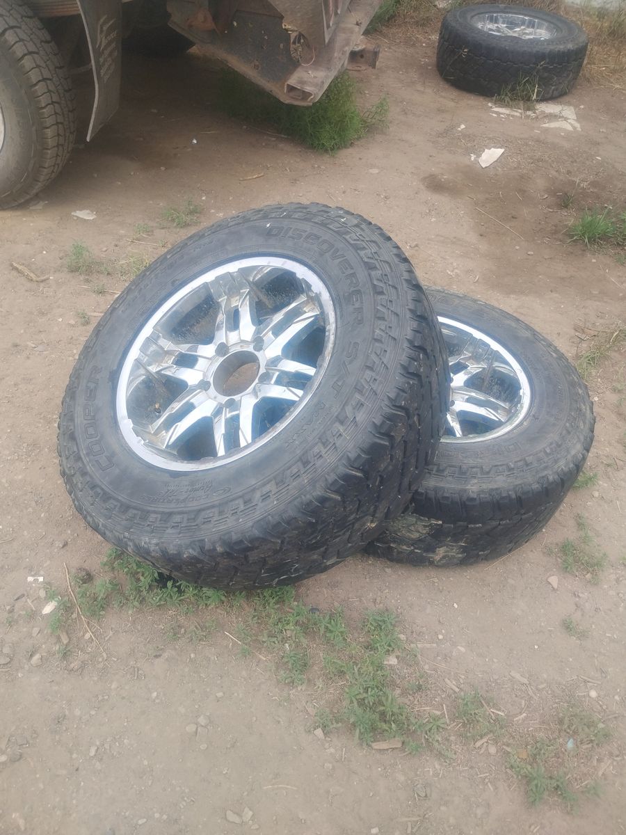 4 5lug rims and tires 285/70R18 the space between the bolt holes is 5 3/4 inches