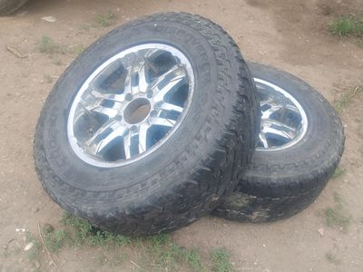 4 5lug rims and tires 285/70R18 the space between the bolt holes is 5 3/4 inches