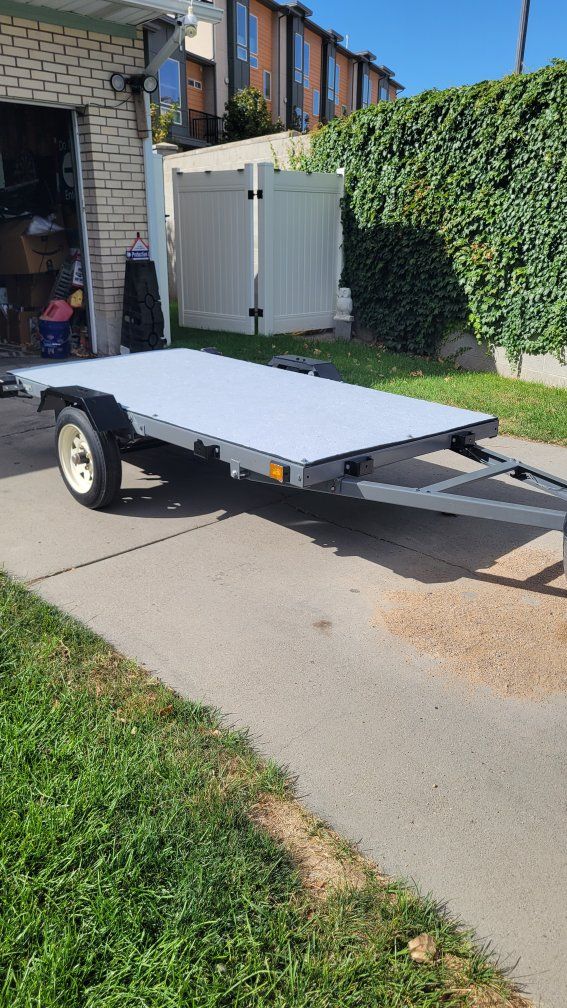 Harbor Freight Utility Trailer with 4 x 8 Flat Bed, Fenders,  new waterproof under deck, paint and upgraded new led taillights