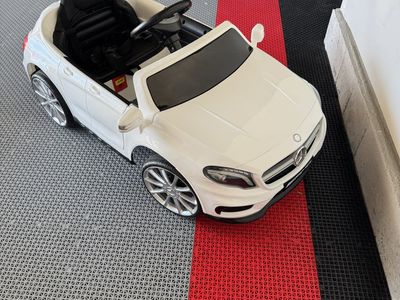 White Mercedes kids car