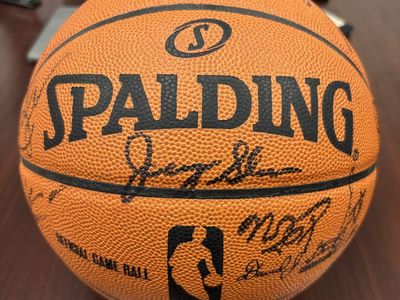 Spalding Official NBA game ball signed by the 2009-2010 Utah Jazz Team