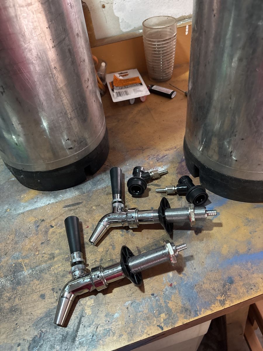 Homebrew kegs with taps. 