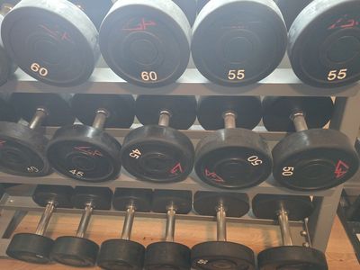 GP. gym quality dumbells. 5-70 lb pairs