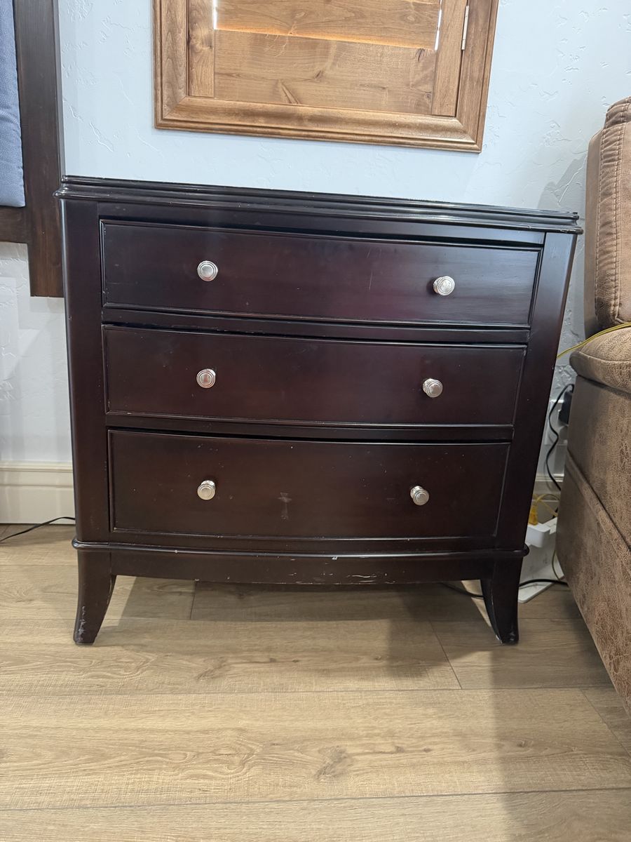 Black nightstand with 3 drawers