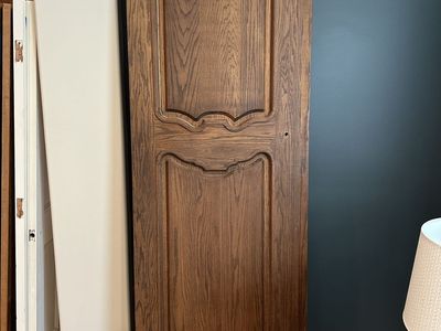 Quality solid wood interior doors removed during a remodel. These are not hollow-core or MDF—they are solid wood construction.