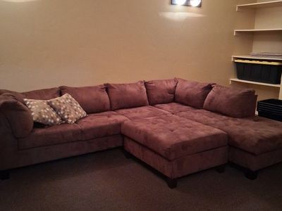Comfortable Brown Sectional Sofa with Ottoman - Spacious Seating