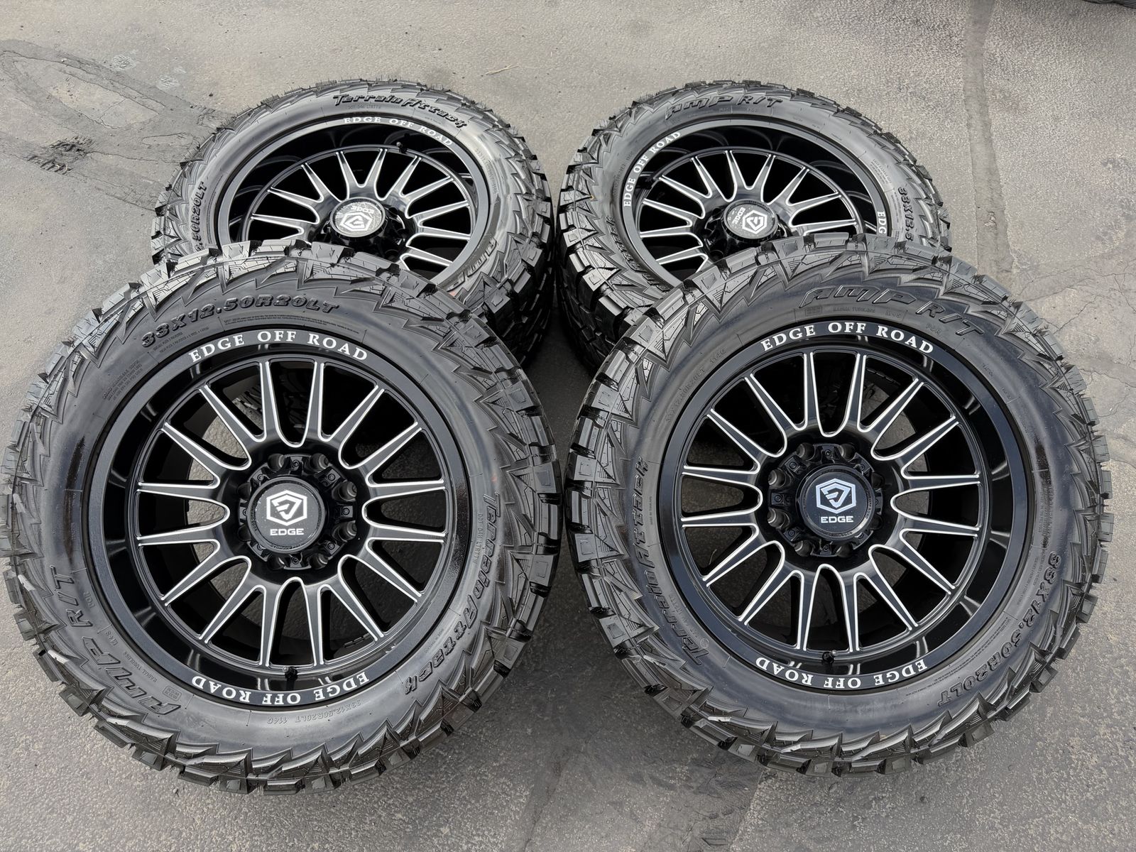 New Edge 305 Offroad Black Milled 33x12.50r20 AMP RT 8x6.5 Dodge Ram Cummins Chevy Silverado GMC Duramax wheels and tires 8 lug 