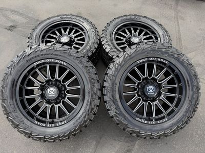 New Edge 305 Offroad Black Milled 33x12.50r20 AMP RT 8x6.5 Dodge Ram Cummins Chevy Silverado GMC Duramax wheels and tires 8 lug