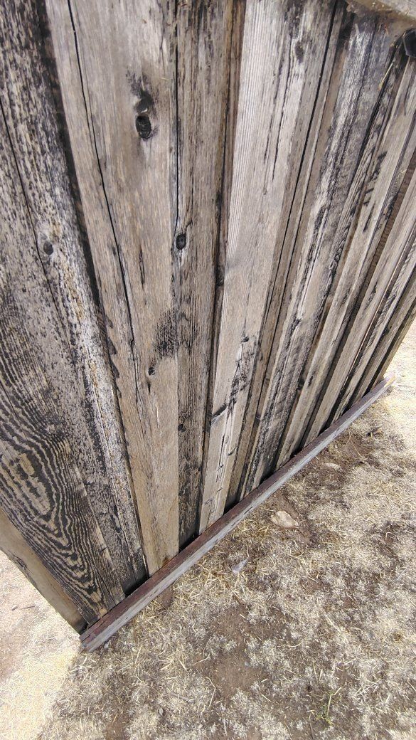 Reclaimed cedar fencing, panels are 6x7-8. Board over board